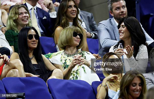 Vera Wang with Anna Wintour andCheryl Scharf of Usta watch the first round Men's Singles match between Novak Djokovic of Serbia & Montenegro and...