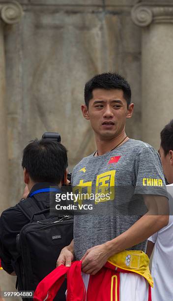 Chinese table tennis player Zhang Jike visits the Ruins of St. Paul's during their visit to Macau after the Rio Olympic Games on August 30, 2016 in...