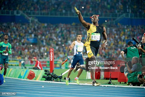 Summer Olympics: Jamaica Usain Bolt in action victorious winning gold medal in Men's 4x100M Relay Final at Rio Olympic Stadium. Rio de Janeiro,...