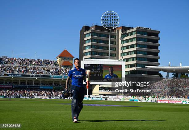 England batsman Alex Hales raises his bat as he leaves the field after scoring 171, the highest by an English batsman in a One Day International...