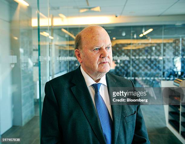 Michael Noonan, Ireland's finance minister, poses for a photograph following a Bloomberg Television interview in Dublin, Ireland, on Tuesday, Aug....
