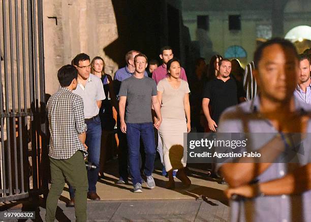 Mark Zuckerberg is seen with his wife Priscilla Chan during a private visit to the Colosseum on August 29, 2016 in Rome, Italy.