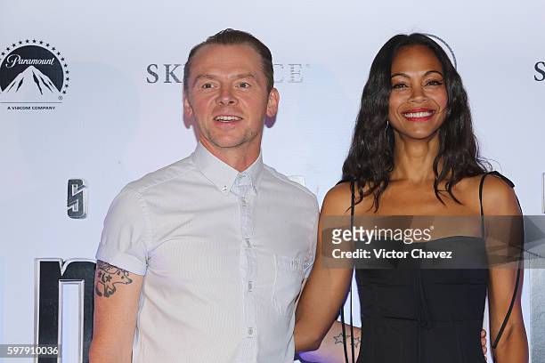 Actor Simon Pegg and actress Zoe Saldana attend a Photocall & Press Conference during the promotional tour of the Paramount Pictures title 'Star Trek...