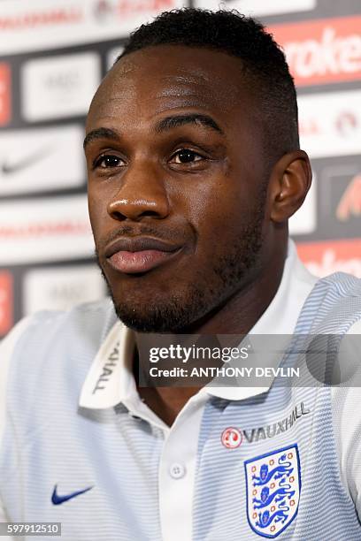 England's Michail Antonio speaks to the media during a press conference at St George's Park near Burton-Upon-Trent in central England on August 30,...