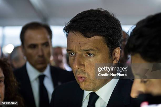 Premier Matteo Renzi attends a funeral mass for victims of earthquake on August 30, 2016 in Amatrice, Italy. Italy has declared a state of emergency...