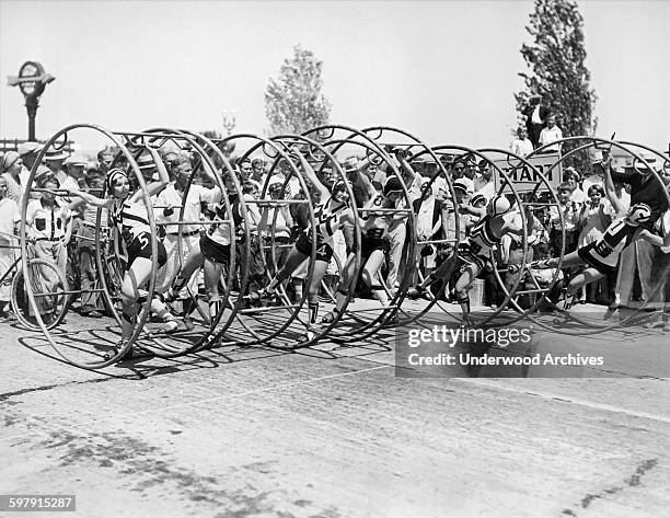 The six women contestants at the starting line in America's first 'human hoop' race which was held at Carthay Circle in Hollywood, Los Angeles,...