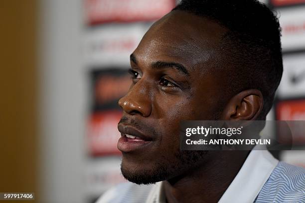 England's Michail Antonio takes part in a press conference at England's training camp in Burton-on-Trent, central England on August 30, 2016. Sam...