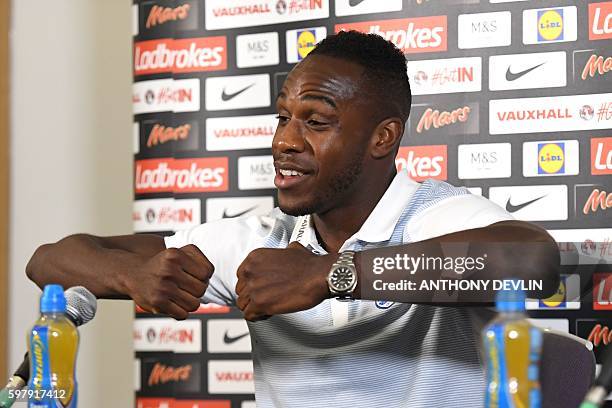 England's Michail Antonio takes part in a press conference at England's training camp in Burton-on-Trent, central England on August 30, 2016. Sam...