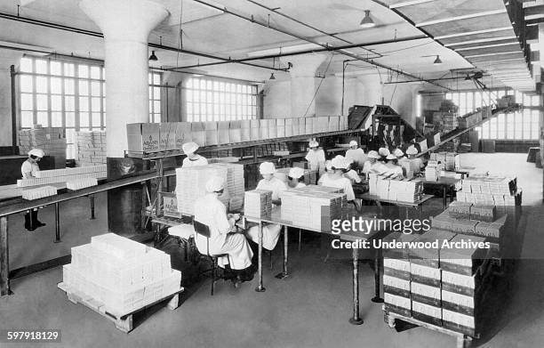 Corner of the packing department at the American Chicle Company where millions of boxes of gum are wrapped and packed for shipping, Long Island City,...