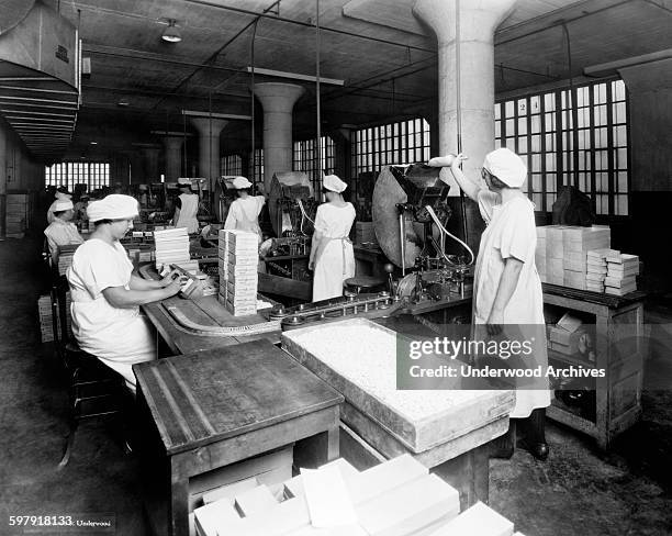 The Chiclet packing department at the American Chicle Company plant, Long Island City, New York, 1923.