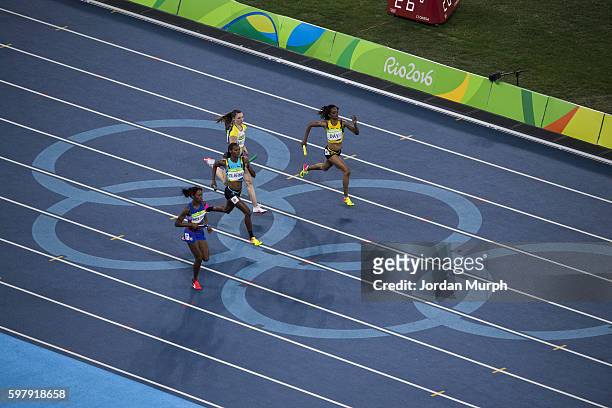Summer Olympics: Overall view of runners in action during the Women's 4x400m Relay Round 1 Heat 2 at the Olympic Stadium. Rio de Janeiro, Brazil...