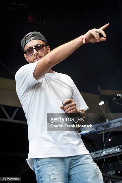 German rapper KC Rebell performs live in support of Kool Savas during a concert at the Zitadelle Spandau on August 26, 2016 in Berlin, Germany.