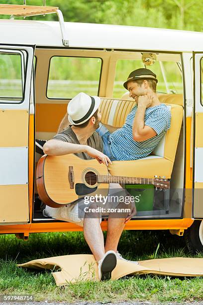 friends laughing - vw bus stock pictures, royalty-free photos & images