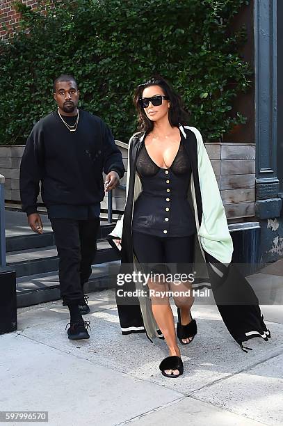 Kanye West and Kim Kardashian are seen walking in Soho on August 30, 2016 in New York City.