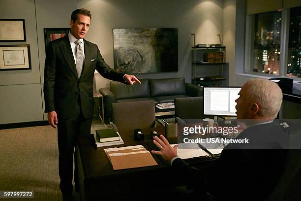The Hand That Feeds You" Episode 609 -- Pictured: Gabriel Macht as Harvey Specter, Neal McDonough as Sean Cahill --