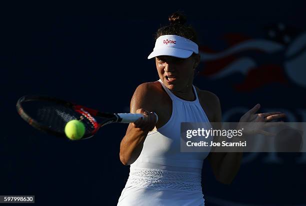 Patricia Maria Tig of Romania returns a shot to Laura Siegemund of Germany during her first round Women's Singles match on Day Two of the 2016 US...