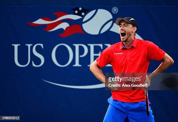 John Millman of Australia reacts against Dominic Thiem of Austria during his first round Men's Singles match on Day Two of the 2016 US Open at the...