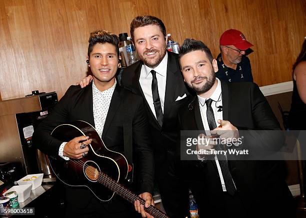 Chris Young poses with Dan Smyers and Shay Mooney during the 10th Annual ACM Honors at the Ryman Auditorium on August 30, 2016 in Nashville,...