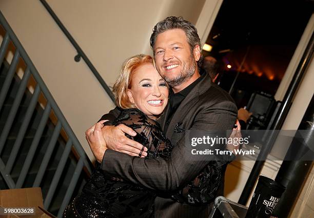 Musical artists Tanya Tucker and Blake Shelton attend the 10th Annual ACM Honors at the Ryman Auditorium on August 30, 2016 in Nashville, Tennessee.