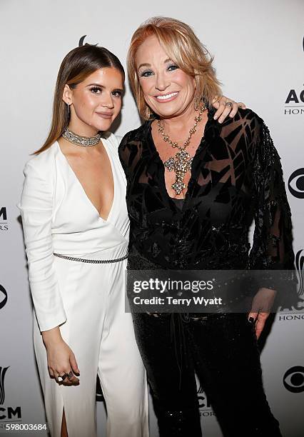 Musical artists Maren Morris and Tanya Tucker attend the 10th Annual ACM Honors at the Ryman Auditorium on August 30, 2016 in Nashville, Tennessee.