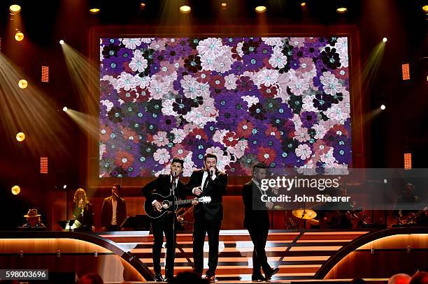 Musical artists Dan Smyers from musical group Dan + Shay, Chris Young and Shay Mooney from musicial group Dan+ Shay perform onstage during the 10th...