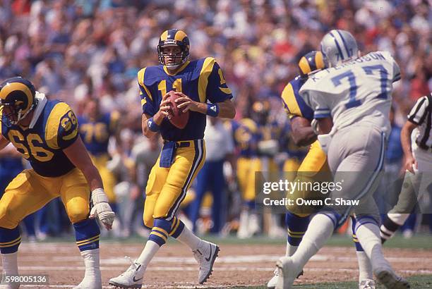 Jim Everett of the Los Angeles Rams circa 1987 drops back to pass against the Detroit Lions at Anaheim Stadium in Anaheim. California.