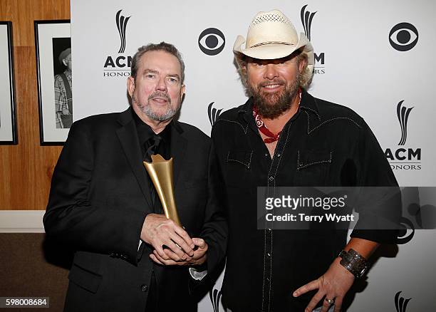 Honoree Jimmy Webb and singer-songwriter Toby Keith attend the 10th Annual ACM Honors at the Ryman Auditorium on August 30, 2016 in Nashville,...