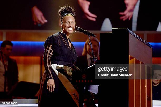 Singer-songwriter Alicia Keys performs onstage during the 10th Annual ACM Honors at the Ryman Auditorium on August 30, 2016 in Nashville, Tennessee.