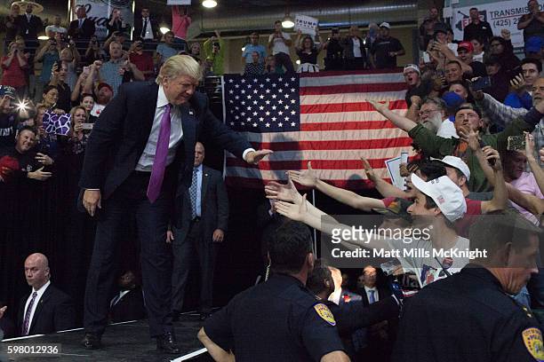 Donald Trump arrives to a campaign rally on August 30, 2016 in Everett, Washington. Trump addressed immigration issues on the same night that his...