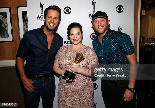 Daughter of honoree Eddie Rabbitt Demelza Rabbitt poses with singer-songwriters Luke Bryan and Cole Swindell during the 10th Annual ACM Honors at the...