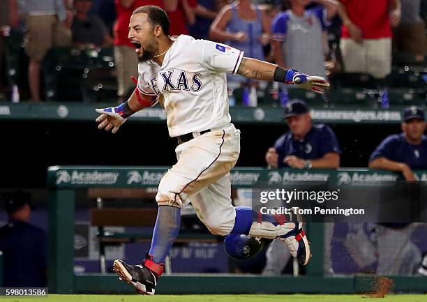 Rougned Odor of the Texas Rangers celebrates after hitting a two-run walk-off homerun against the Seattle Mariners in the bottom of he ninth inning...