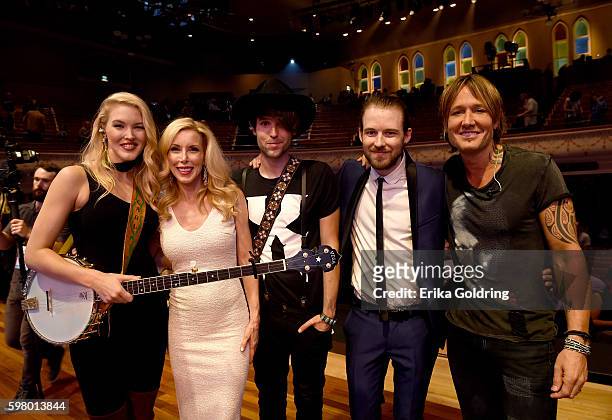 Ashley Campbell, Kimberly Campbell, Shannon Campbell, Cal Campbell, and Keith Urban attend the 10th Annual ACM Honors at the Ryman Auditorium on...