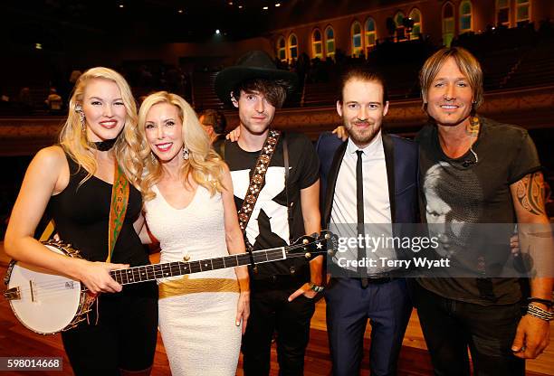 Ashley Campbell, Kimberly Campbell, Shannon Campbell, Cal Campbell, and Keith Urban attend the 10th Annual ACM Honors at the Ryman Auditorium on...