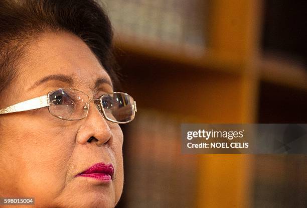 In this picture taken on August 23, 2016 shows Philippine Ombudsman Conchita Carpio-Morales listening to a question during an interview at the Office...