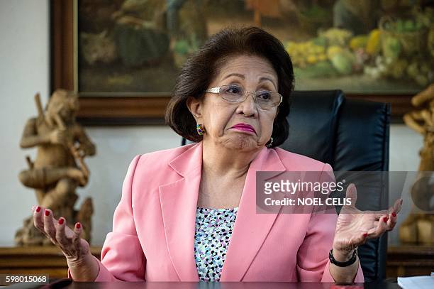 This picture taken on August 23, 2016 shows Philippine Ombudsman Conchita Carpio-Morales gesturing during an interview at the Office of the Ombudsman...