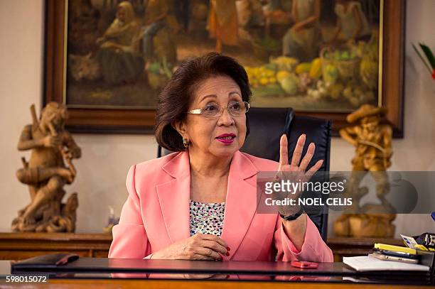 This picture taken on August 23, 2016 shows Philippine Ombudsman Conchita Carpio-Morales gesturing during an interview at the Office of the Ombudsman...