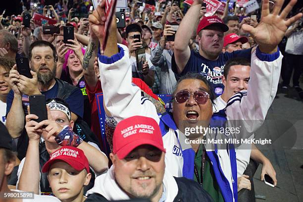 Supporters cheer for Republican presidential candidate Donald Trump at a campaign rally on August 30, 2016 in Everett, Washington. Trump addressed...