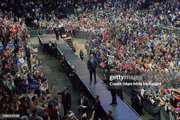 Republican presidential candidate Donald Trump applauds with the crowd at the end of a campaign rally at Xfinity Arena on August 30, 2016 in Everett,...