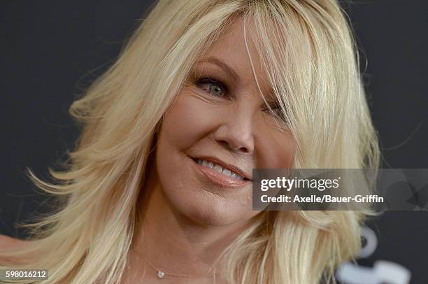 Actress Heather Locklear arrives at the screening of 'Too Close to Home' at The Paley Center for Media on August 16, 2016 in Beverly Hills,...