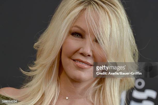 Actress Heather Locklear arrives at the screening of 'Too Close to Home' at The Paley Center for Media on August 16, 2016 in Beverly Hills,...