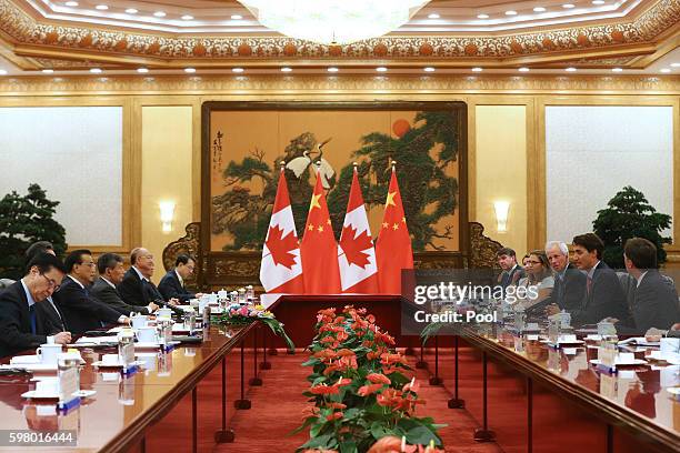 Chinese Premier Li Keqiang and Canadian Premier Justin Trudeau hold a meeting at the Great Hall of the People in Beijing, China, 31 August 2016. The...