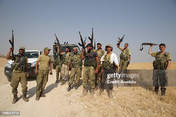 Free Syrian Army members are seen at the area where Sacur Brook located after taking control of the area from Daesh terrorists during the "Operation...