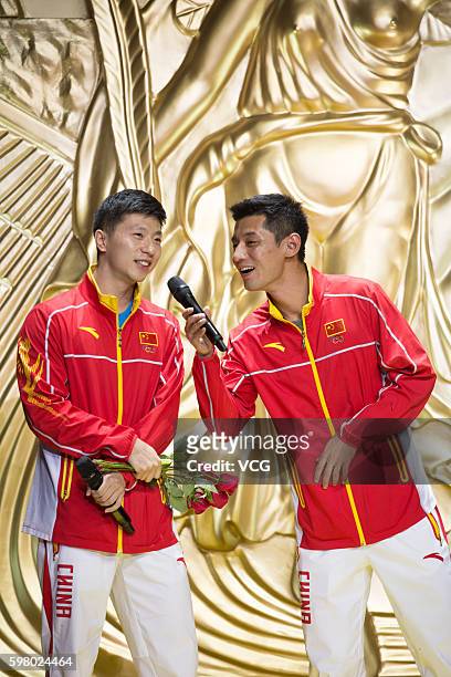 Chinese table tennis players Ma Long and Zhang Jike attend a party at East Asian Games Dome during their visit to Macau after Rio Olympic Games on...