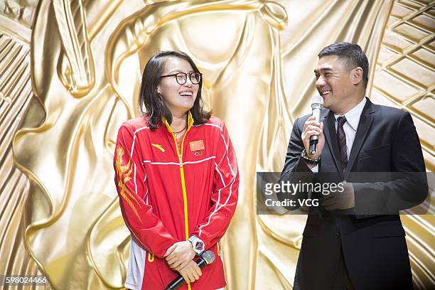 Chinese swimmer star Fu Yuanhui and host Wu Dawei attend a party at East Asian Games Dome during their visit to Macau after Rio Olympic Games on...