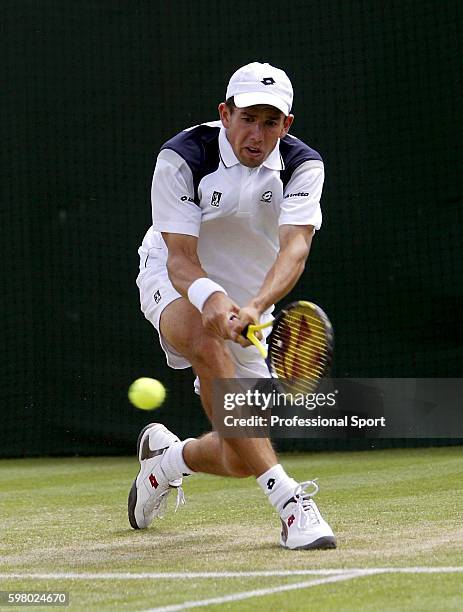 Dominik Hrbaty of Slovakia in action during his second round match against Mark Hilton of Great Britain at the Wimbledon Lawn Tennis Championship on...