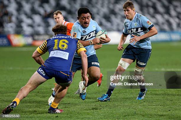 Phil Kite of Northland looks to fend off Liam Coltman of Otago during the round three Mitre 10 Cup match between Otago and Northland at Forsyth Barr...