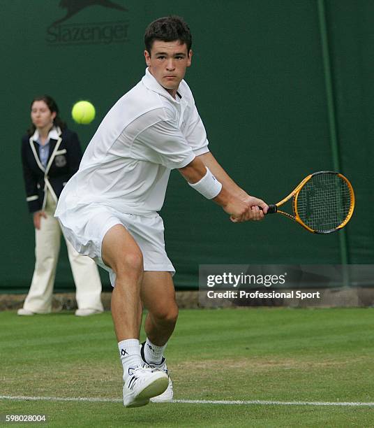 Jamie Baker of Great Britain in action against Andreas Seppi of Italy during day two of the Wimbledon Lawn Tennis Championships at the All England...