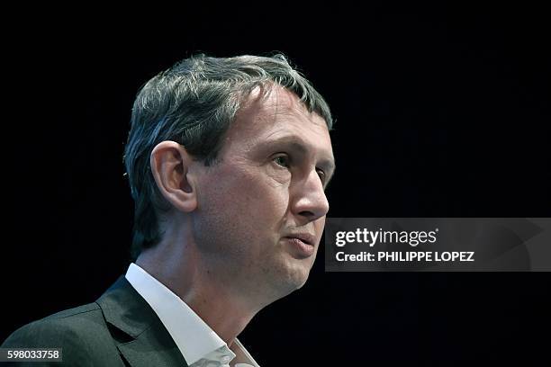 Maxime Lombardini, the general director of French provider of telecommunication services Iliad, addresses a press conference in Paris on August 31,...