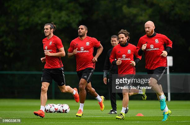 Wales players Gareth Bale Ashley Williams, Joe Allen and James Collins in action during Wales training ahead of their FIFA World Cup qualifier...