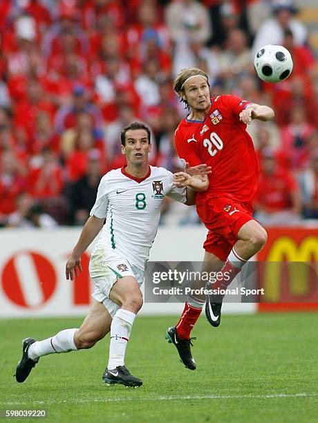 Armando Goncalves of Portugal and Jaroslav Plasil of the Czech Republic in action during the UEFA EURO 2008 Group A match between the Czech Republic...